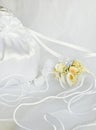 Wedding flowers and bridal bag over veil Royalty Free Stock Photo