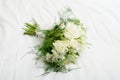 Wedding flowers Bridal bouquet of white flowers tied with a ribbon