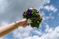 Wedding flowers bride ,Woman holding colorful bouquet with her hands.