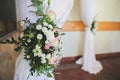Wedding flowers decoration. Marriage celebration. White satin lace