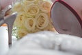 Wedding flowers, high-heel shoe and an opened red box