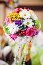 Wedding flowers roses and daisies bright on the table