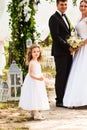 Wedding flying rose petals from kids at ceremony