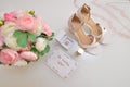 Wedding accessories. Shoes, bouquet and invitation. Royalty Free Stock Photo