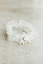 Wedding garter on a white background bridal accessory Royalty Free Stock Photo