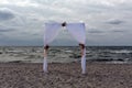 Wedding gate on Baltic seashore. Royalty Free Stock Photo