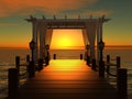 Wedding gazebo on the wooden pier at sunset