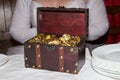 Wedding gift in form of a chest with a lot of golden coins 20 CZK.