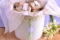 Wedding gifts original guest gift boxes natural soaps in white decorative bucket with cotton lace and custom label Royalty Free Stock Photo