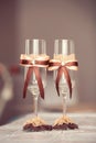 The wedding glasses decorated with a bow Royalty Free Stock Photo