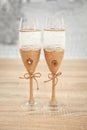 Wedding glasses decorated with cord, beautiful decorated wedding glasses, flowers on wedding glasses, handmade wedding