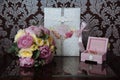 Wedding gold rings and bouquet of flowers on a dark wooden table. Concept marriage. Royalty Free Stock Photo