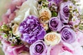 Wedding gold rings on a bouquet of flowers Royalty Free Stock Photo