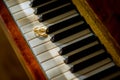 Wedding gold rings on the piano. Closeup. Love concept. Bride and groom accessories. Royalty Free Stock Photo