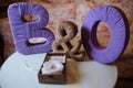 Wedding gold rings in a wooden box on the white background. Blue character of fabric Royalty Free Stock Photo