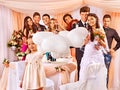 Wedding group people in banquet hall. Royalty Free Stock Photo