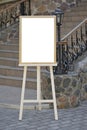 Wedding guest list on wooden easel