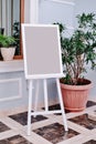 Wedding guest list on wooden easel