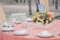 Wedding guest table decorated with bouquet and settings Royalty Free Stock Photo