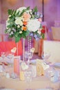 Wedding guest table decorated with bouquet and settings Royalty Free Stock Photo