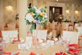 Wedding guest table decorated with bouquet and settings Royalty Free Stock Photo