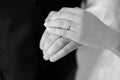 Wedding, hand of the bride and groom close-up, wedding rings, horizontal photo, black and white photo Royalty Free Stock Photo