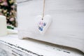 Wedding hand made decoration, wooden heart with flowers