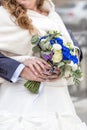 Hands with engagement rings of newly wedded