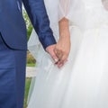 Hands of newly wedded in time of wedding ceremony