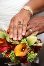 Wedding Hands and Rings on Tropical Bouquet Royalty Free Stock Photo