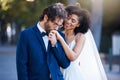 Wedding, happy couple and kiss on hand at marriage celebration event together with commitment. Interracial man and woman Royalty Free Stock Photo
