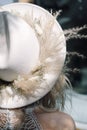 Wedding hat of the bride decorated with flowers