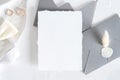 Wedding invitation card mockup, grey envelopes, rings on white background. Flat lay, top view. Minimal style Royalty Free Stock Photo