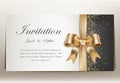 Wedding invitation with golden ribbon and bow.