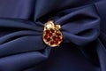 Wedding jewelry, golden ring with red rubies