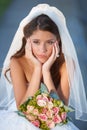 Wedding jitters. a sad-looking young bride on her wedding day.