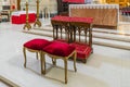 Wedding kneeler and chairs in Catholic church Royalty Free Stock Photo