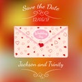 Wedding letter with lace and texture of hearts over colorful blurred background.