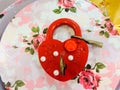 The red lock is on the flower box (gift) Royalty Free Stock Photo