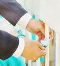 Wedding lock closeup in groom hands Royalty Free Stock Photo