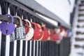 Wedding locks on the railing of the stairs.