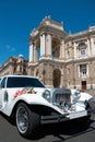 Wedding luxury white limousine awaiting in front of a palace Royalty Free Stock Photo