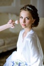 Wedding makeup artist making a make up for bride Royalty Free Stock Photo