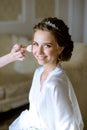 Wedding makeup artist making a make up for bride Royalty Free Stock Photo