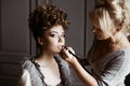 Wedding makeup artist making a make up for bride Royalty Free Stock Photo