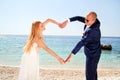 Wedding married couple of hands make a real heart Royalty Free Stock Photo