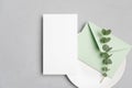 Wedding menu card mockup with envelope and eustoma flowers, blank mockup