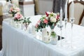 Wedding mirror table with flowers and candles close to