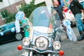 Wedding motorcycle decorative with bows and ribbons. Biker wedding concept.