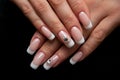 Wedding nails with crystals on black background Royalty Free Stock Photo
